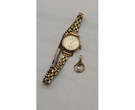 A Certina 9ct gold ladies manual wind wrist watch on a gold plated bracelet, together with a 9ct gold pendantLocation: 
