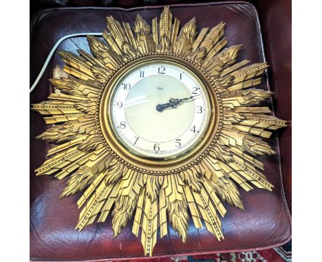 A vintage Smith wall hanging Star burst clock, converted to three pin plug A/FLocation: 