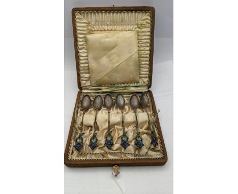 Six Continental coffee and enamel spoons in case, total weight 46.5gLocation: 