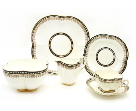 A late Victorian Coalport 51 piece tea set, of lobed form