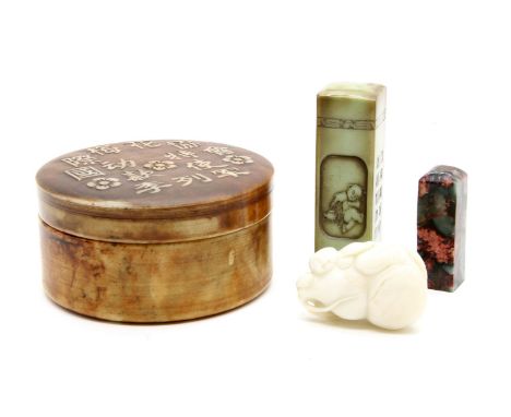 A Chinese soapstone seal, from International Prunus Association, in a circular box, two other seals and a jade carving of a b