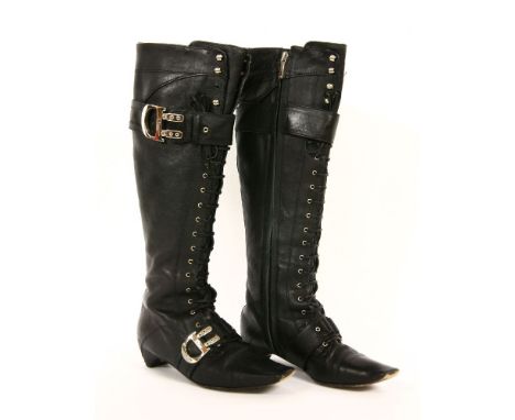 A pair of Christian Dior black calf leather knee-high boots, lace-up front with two silver-tone 'D' shaped buckles, kitten he