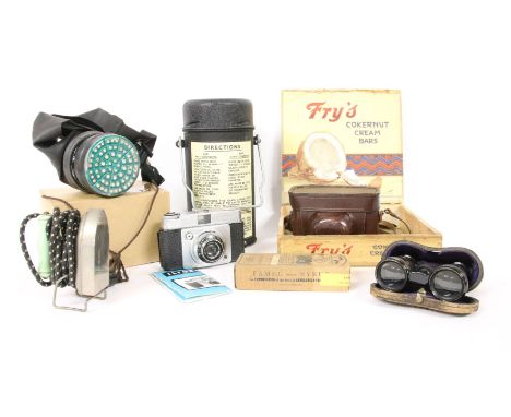 A mixed lot of collectables, to include an Ilford Sportsman 35mm camera, a respirator, a pair of opera glasses, an emergency 