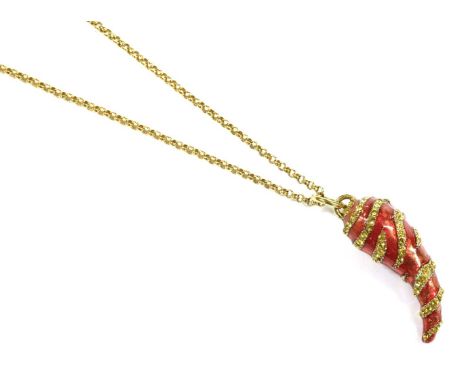 A gold-tone Roberto Cavalli 'horn of life' pendant, featuring a horn charm with red enamel base, embellished with yellow past
