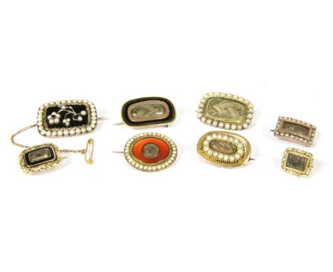 Eight assorted Georgian and later memorial brooches, to include a gold Cornelian and split pearl brooch with woven hair locke