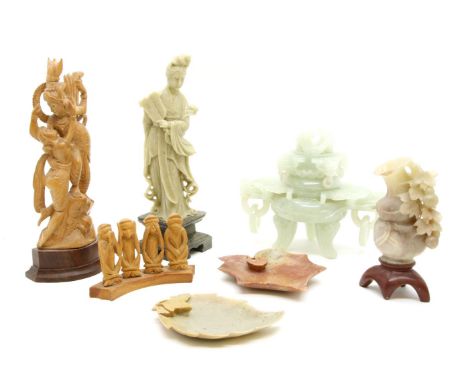 A collection of hardstone and wood carvings, to include a Chinese jade koro, a soapstone figure and two leaf form dishes and 