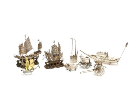 A small Chinese silver model of a junk, together wish a filligree model of a ship, a white metal model of a sailing ship, a C