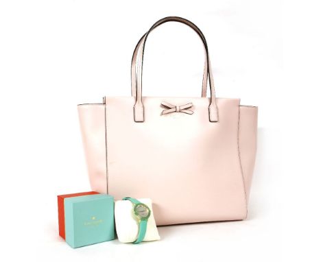 A Kate Spade of New York pink leather tote handbag, with applied pink bow, stamped lettering and matching shoulder straps, wi