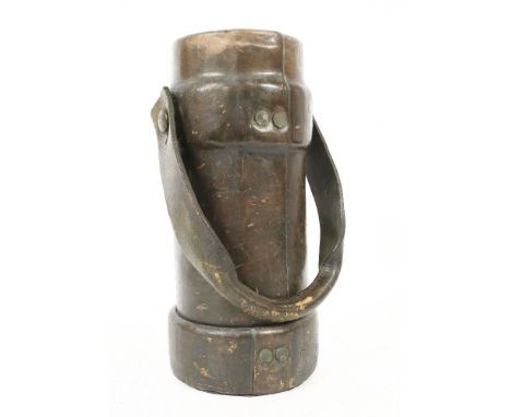A leather ammunition carrier with coat of arms. 35cm high