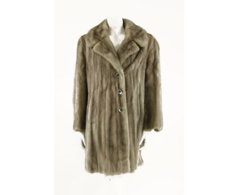 A mink fur coat, with single breasted button up coat