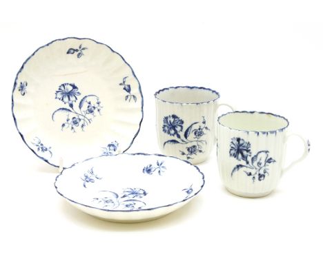 A near pair of 18th century Worcester porcelain coffee cups and saucers, each decorated in the Gilliflower pattern over flute