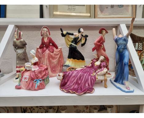 A set of five Continental pottery Art Deco style figures; together with a Royal Doulton figure of 'Penelope'; and Franklin Mi