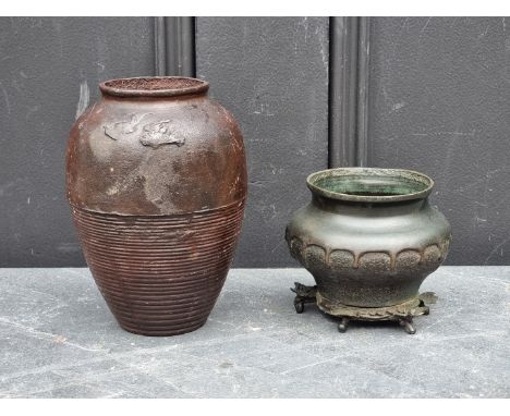 A Japanese bronze drip vase,&nbsp;probably Meiji, 8.5cm high; together with a similar bat vase, signed, 15cm high. (2) 