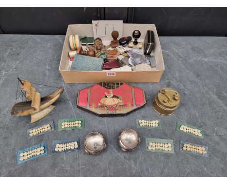 A mixed lot, to include: false teeth; lighters; brass sextant etc. 