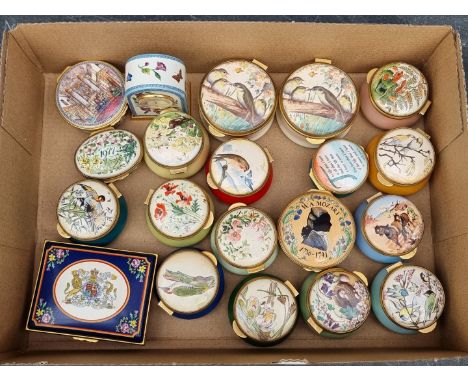 A collection of Halcyon Days and other similar enamel boxes,&nbsp;to include a musical example; and a similar timepiece. (20)