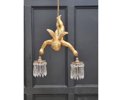 A gilt cherub twin branch ceiling light, approx.&nbsp;50cm high. 