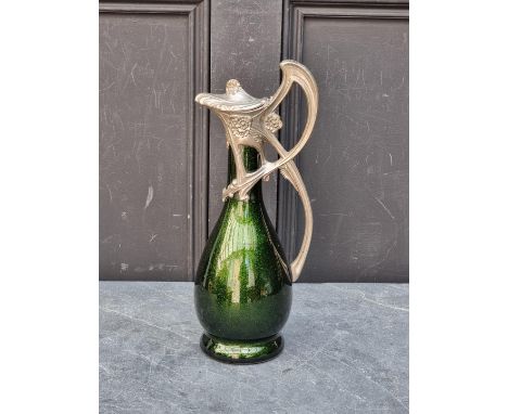 An Art Nouveau pewter and aventurine glass claret jug,&nbsp;33.5cm high. 