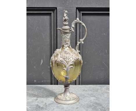 A Continental Art Nouveau pewter and green glass claret jug and stopper,&nbsp;39cm high, (the stopper probably associated). 