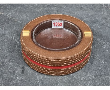 A Gucci leather ashtray, 18cm diameter.&nbsp; 