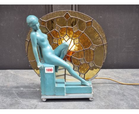 An Art Deco plaster and leaded glass figural table lamp,&nbsp;33.5cm high. 