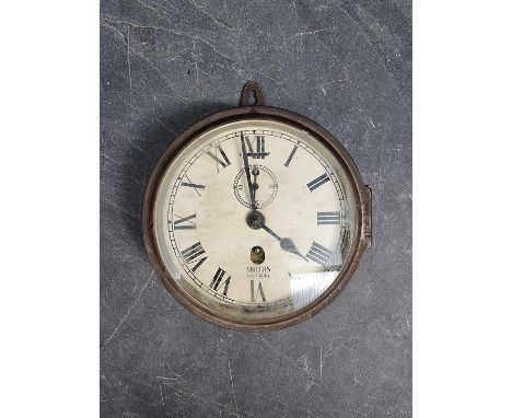 A vintage Smiths 'Astral' brass bulkhead timepiece, 18.5cm diameter.&nbsp; 