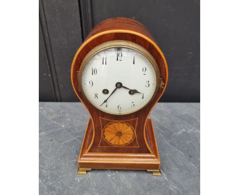 A circa 1900 mahogany and inlaid balloon form mantle clock,&nbsp;29cm high, with pendulum. 