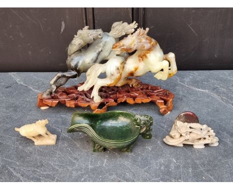 A Chinese green jade archaistic vessel, 15.5cm long; together with another hardstone figure group of two horses, (extensive r