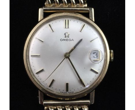 A gentleman's 1960's 9ct gold Omega manual wind wrist watch, with baton numerals and date aperture, on an associated 9ct gold