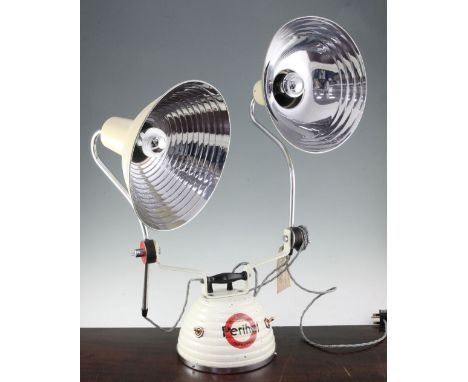 A 1940's Perlihel adjustable twin sun lamp, now converted to a desk lamp with two circular ribbed shades and beehive stepped 