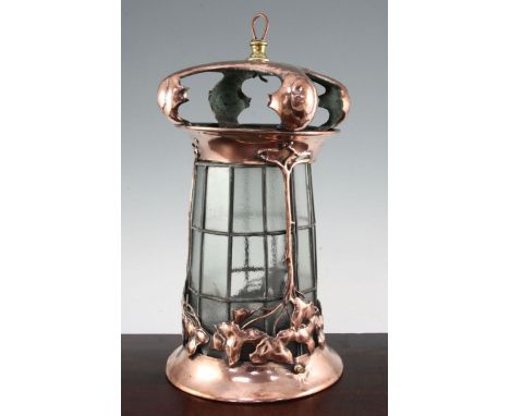 An Art Nouveau copper ceiling lantern, with lead light glass panels and pierced Art Nouveau tendril decoration, 17in.