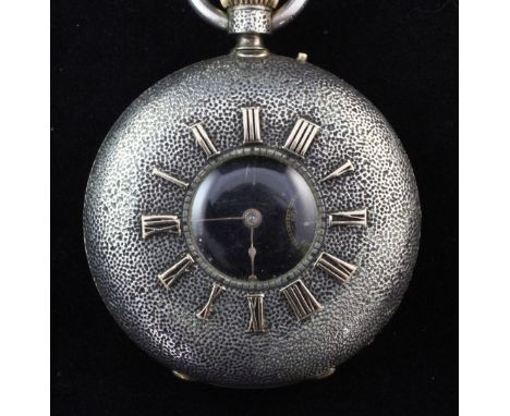A late 19th/early 20th century Swiss textured gun metal keyless lever half hunter pocket watch retailed by Hess & Metford, wi