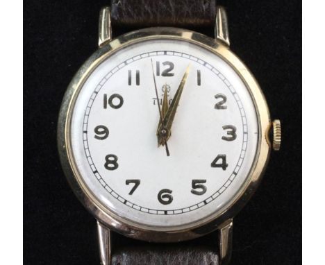 A gentleman's 1950's? gold Tudor manual wind wrist watch, with Arabic dial, on later associated leather strap.