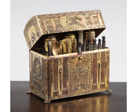 An early 19th century French gilt brass necessaire, with bright cut decoration depicting musical trophies, columns, architect