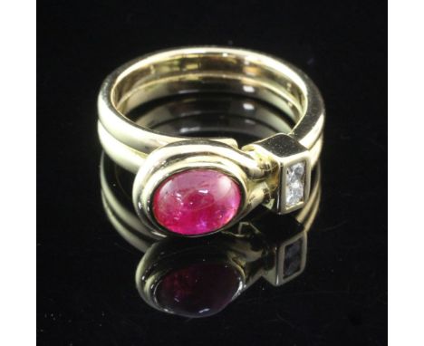 A 1950's/1960's? French 18ct gold ruby and diamond ring, set with oval cabochon ruby and two round cut diamonds, size L.