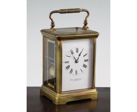 An Edwardian ormolu hour repeating carriage clock, with enamelled dial signed Hamilton & Inches, and French movement, 5.5in.