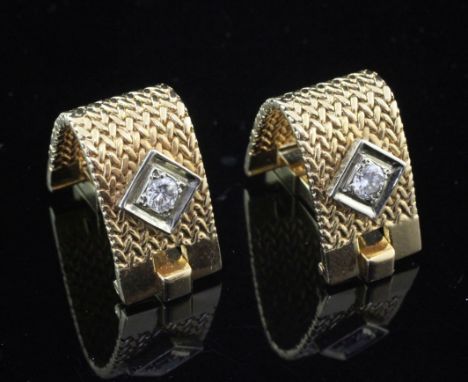 A pair of French 18ct gold and diamond set cufflinks, of domed loop form, with textured mesh links and each set with a single