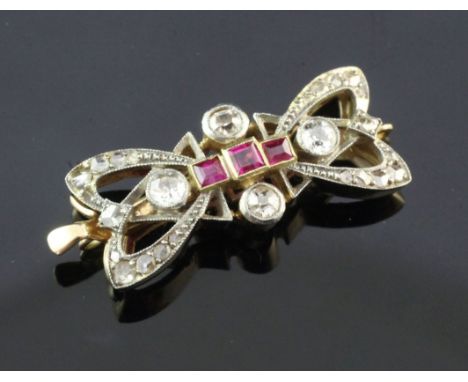 An Edwardian Belle Epoque gold, ruby and diamond set necklace clasp, of ribbon bow form, 1.25in approx.