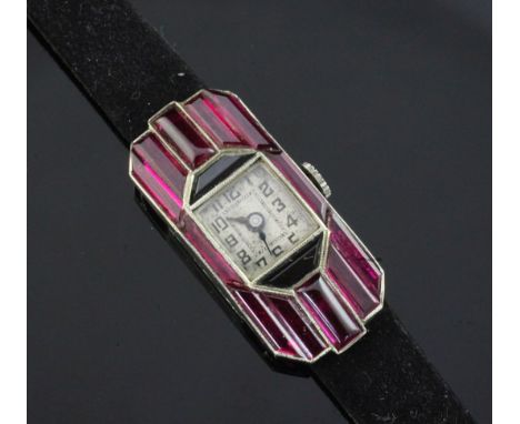 A lady's 1930's Art Deco continental 18ct white gold and synthetic ruby set cocktail watch, of shaped rectangular form, on la