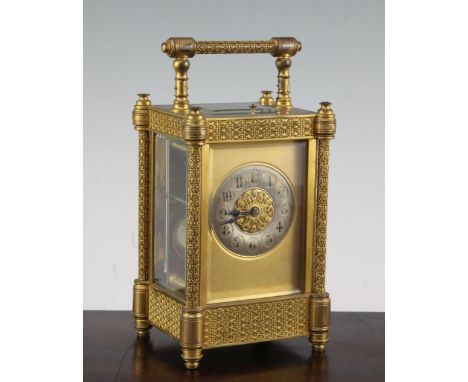 A late 19th century French ormolu hour repeating carriage clock, with blind fretwork decorated case and movement striking on 