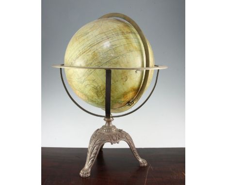 A French 12 inch terrestrial globe, c.1900, by G.Thomas, with coloured paper gores and engraved brass horizon ring with folia