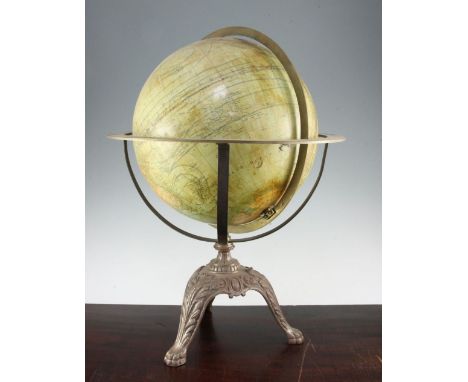 A French 12 inch terrestrial globe, c.1900, by G.Thomas, with coloured paper gores and engraved brass horizon ring with folia