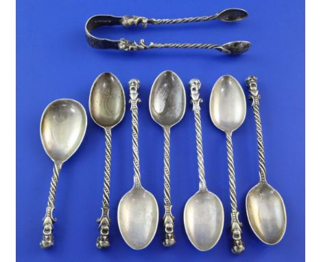 A set of six Victorian silver "Charles Darwin?" spoons with matching tongs and caddy spoon, with spiral stems and bust termin