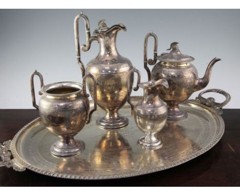 A Victorian four piece plated tea service and two handled tea tray by James Dixon & Sons, of baluster form, each finely engra