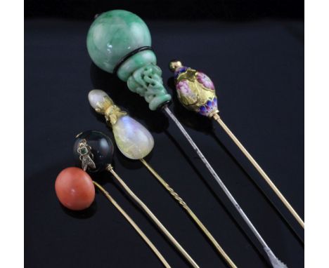 Three assorted late 19th/early 20th century gold stick pins, to include, coral, moonstone and pearl and bloodstone sphere wit