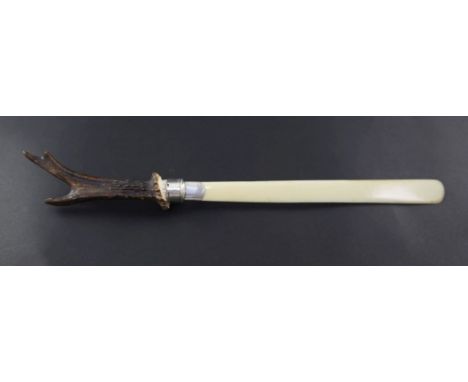 A Victorian ivory and horn handled silver mounted paper knife, retailed by Rowland Ward & Co, 166 Piccadilly, hallmarks for C