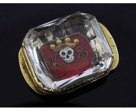 A late 17th century gold mounted stuart crystal mourning slide, of rectangular form with canted corners, depicting a crowned 