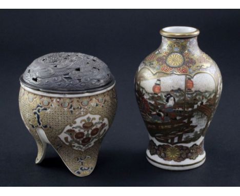 A Japanese Satsuma pottery tripod koro and a similar baluster vase, Meiji period, the koro richly decorated with flower reser