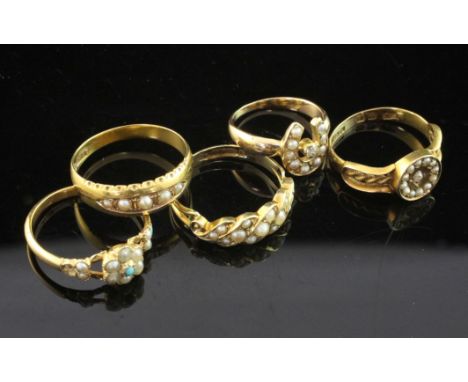 Two late Victorian 15ct gold and split pearl set rings, two similar split pearl and diamond rings, 18ct and unmarked and a go