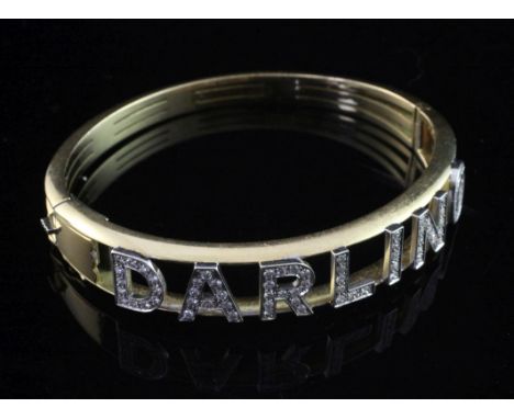 A gold and diamond "Darling" hinged bangle, set with seventy six round cut diamonds, unmarked, gross weight 36 grams.
