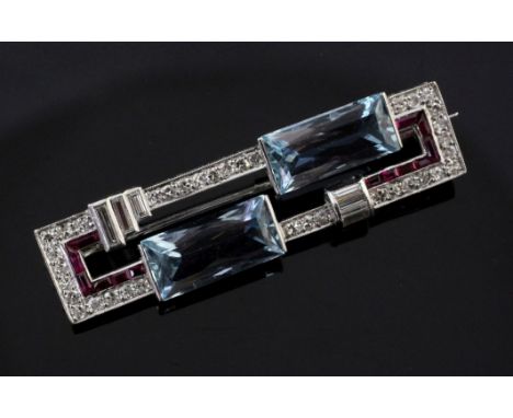 A 1930's/1940's Art Deco platinum, aquamarine, synthetic ruby? and diamond set bar brooch, of rectangular open work design, 1